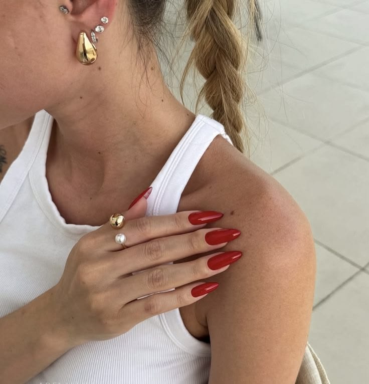 Red nails on a white tshirt