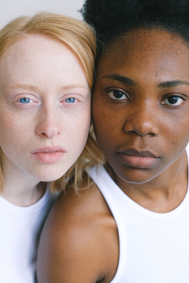 two women with different skin colour depths in their colour season analysis